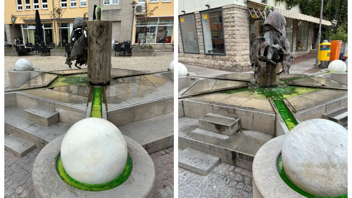 Im Brunnen mit den bronzenen Schweinen war das Wasser grün.