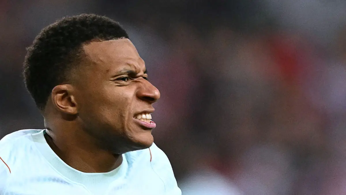 FBL-EUR-NATIONS-TUR-FRA: France's forward #10 Kylian Mbappe reacts after scoring the opening goal and to a leg pain during the UEFA Nations League (League A, Group 1) first leg football match between Turkey and France at the Kocaeli Stadium in Izmit, on September 25, 2026. (Photo by OZAN KOSE / AFP)