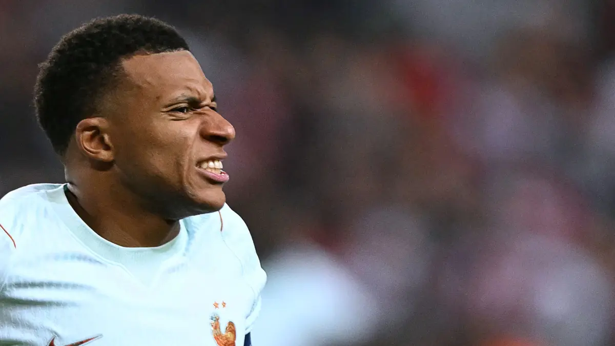 FBL-EUR-NATIONS-TUR-FRA: France's forward #10 Kylian Mbappe reacts after scoring the opening goal and to a leg pain during the UEFA Nations League (League A, Group 1) first leg football match between Turkey and France at the Kocaeli Stadium in Izmit, on September 25, 2026. (Photo by OZAN KOSE / AFP)
