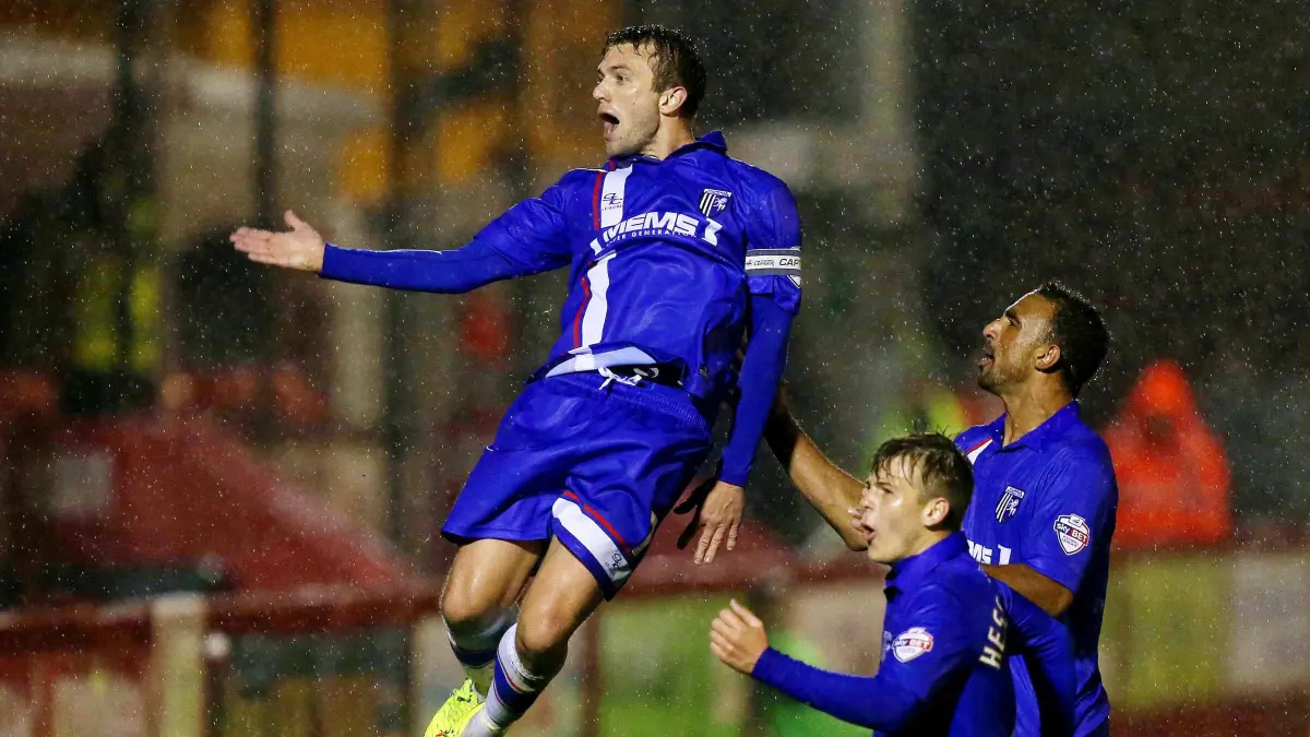 Nov 11, 2014 - Crawley, England, United Kingdom - DOUG LOFT leaps as he celebrates with team mates after scoring the second goal for Gillingham against Crawley Town in the Johnstone s Paint Trophy Southern Area Quarter Final at Broadfield Stadium. Copyright: xPeterxCziborrax